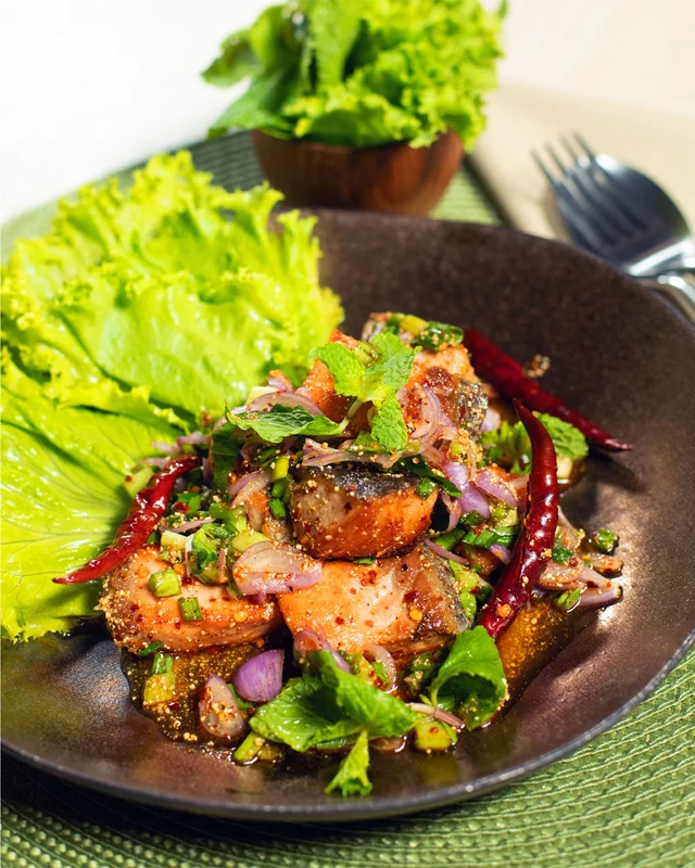 Hitting all the right notes with it's spicy and tangy flavour, this salmon larb is a refre
